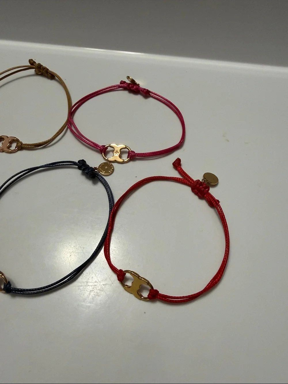 7 Tory Burch Gold Accent Cord Bracelet - Multiple Colors